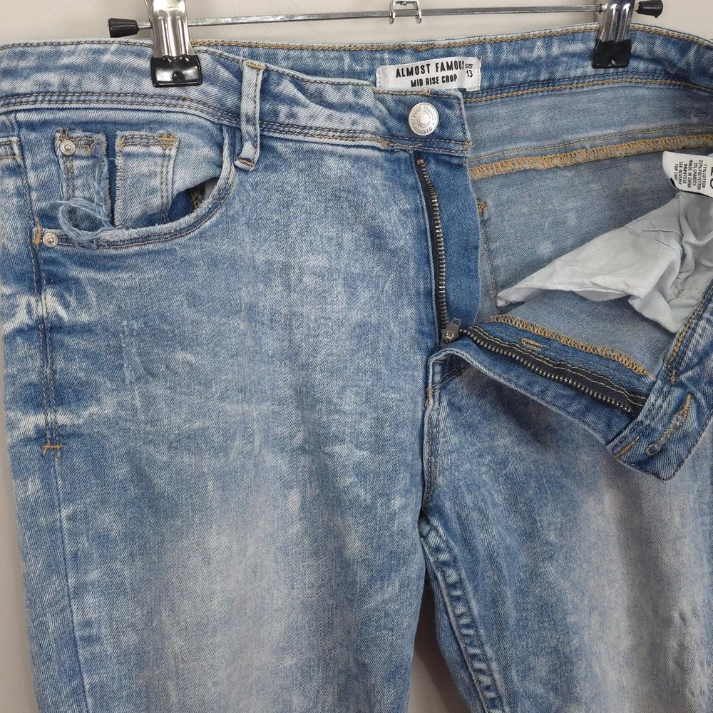 Almost Famous Mid Rise Crop Jeans Jr 13 Light Wash Distressed Raw Hem Zip Ankles